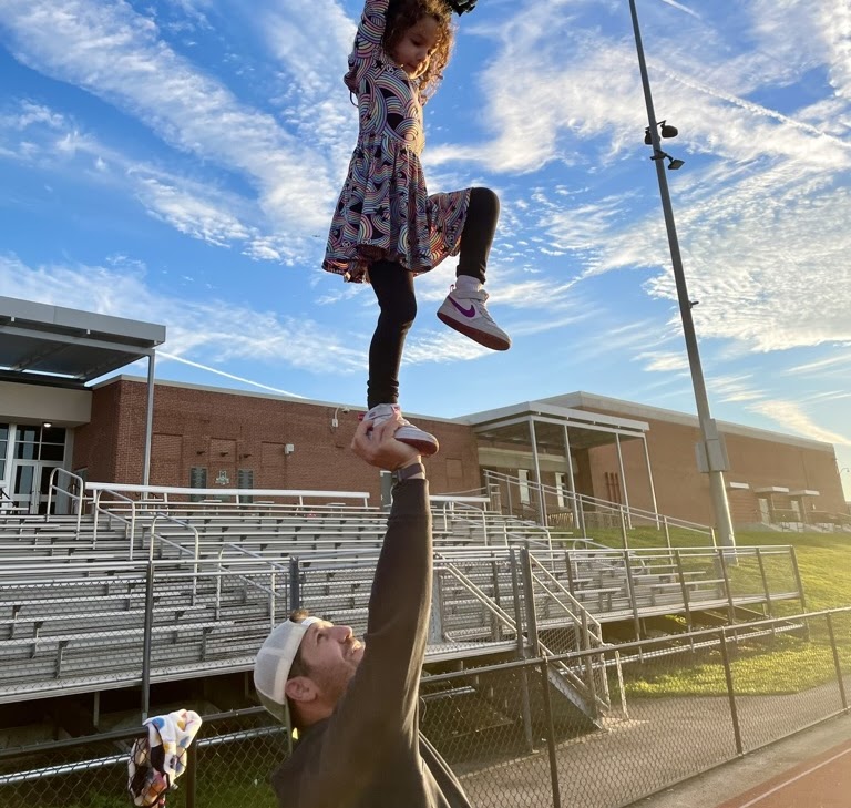 Coach Sean teaching kids cheerleading class in Philadelphia